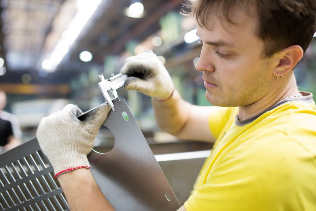 Sheet Metal Worker with Caliper